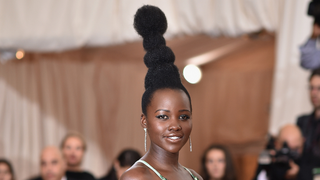 Lupita Nyong'o Checks <i>Vogue</i> for Comparing Her Hairdo to Audrey Hepburn's
